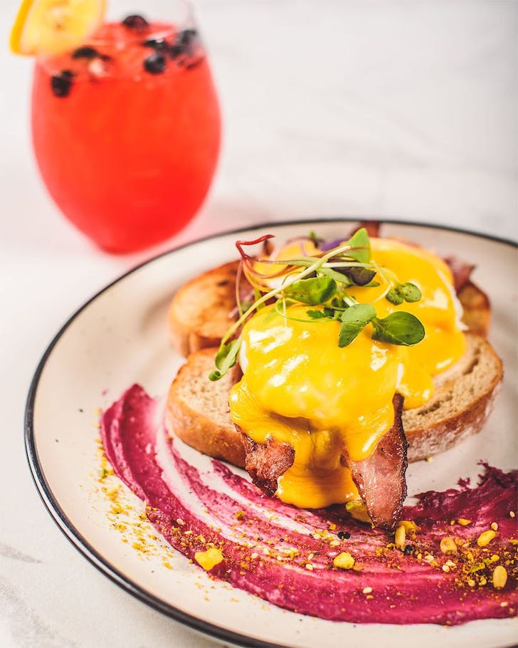 A delicious looking eggs benny at Camarosa in Newstead.