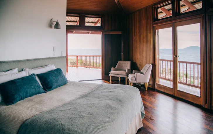a bedroom in a luxe cabin
