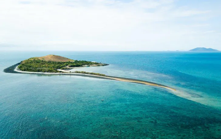 a drone shot of a small island 