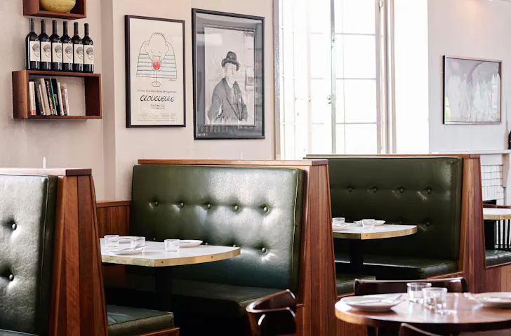 Green booths at Bar Rochford in Caberra