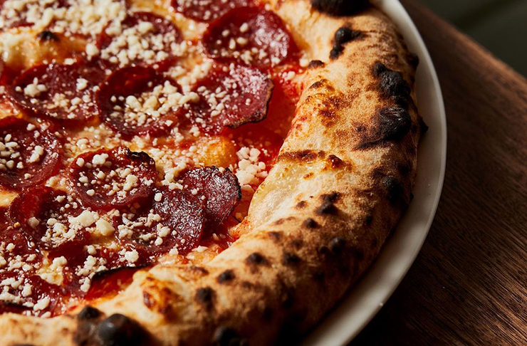 A cheesy pepperoni pizza from one of Melbourne's best restaurants, Capitano.