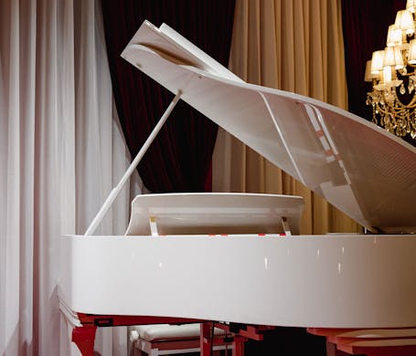 A white grand piano at Cardea bar in Sydney