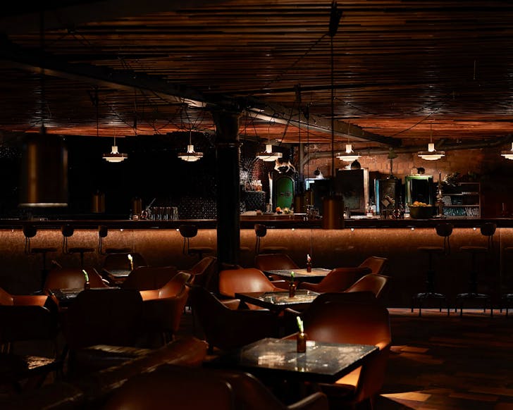 The dimly lit interiors of the chic Caretaker cocktail bar.