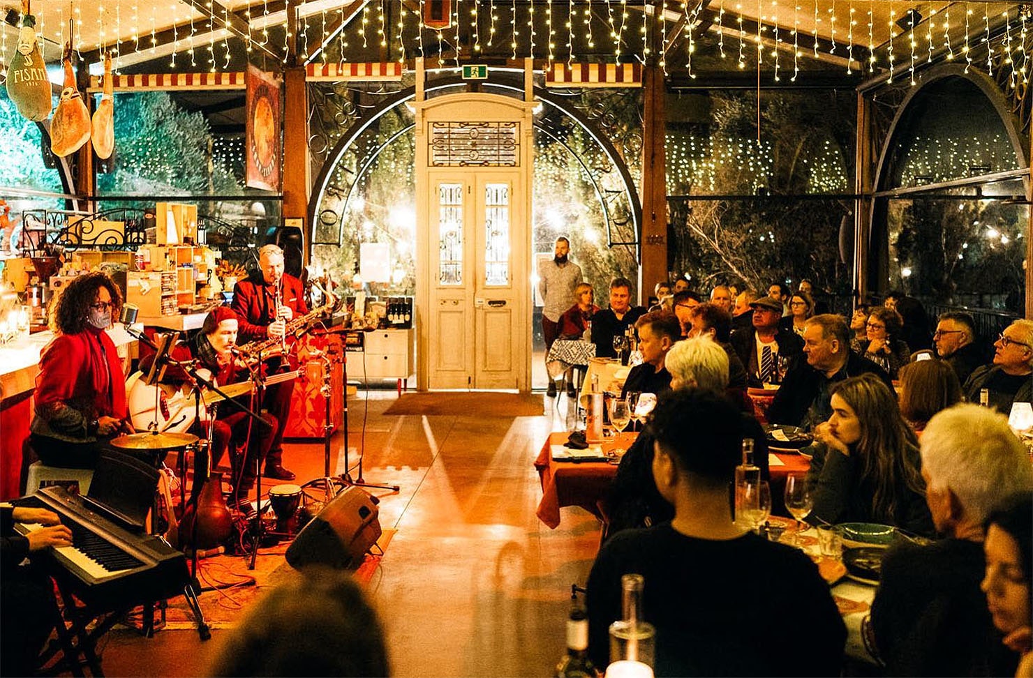 People watch rapt as jazz artists play at Casito Miro.
