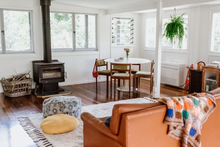 A view of the living space and fireplace at The Lake Shack