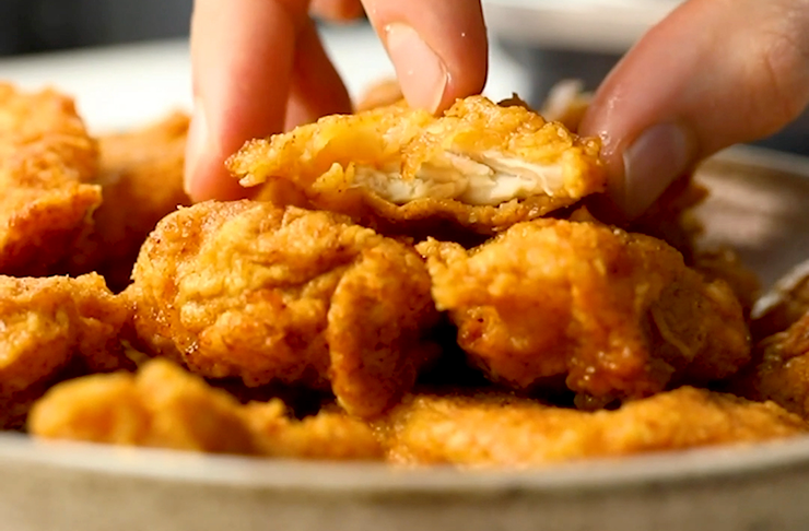 A large bowl of chicken nuggets.