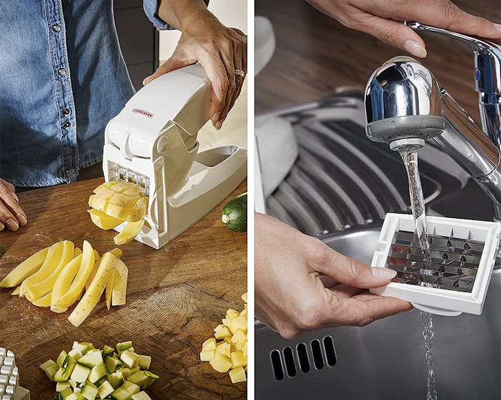 A potato chipper being rinsed under the tap.