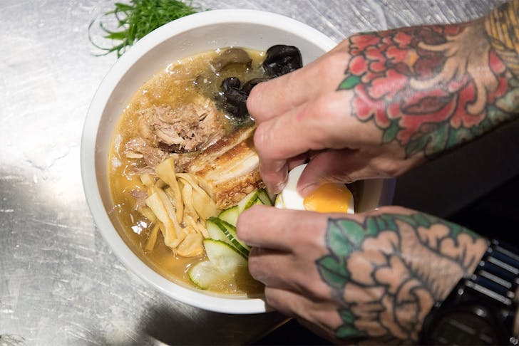 The chef assembles a delicious bowl of ramen at Auckland's Chop Chop Noodle House.