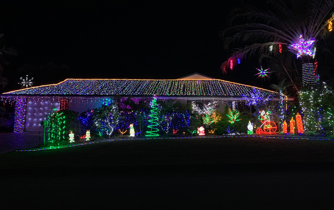 a house lit by christmas lights