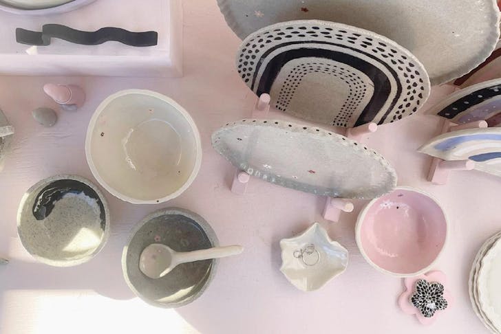 a table full of ceramics
