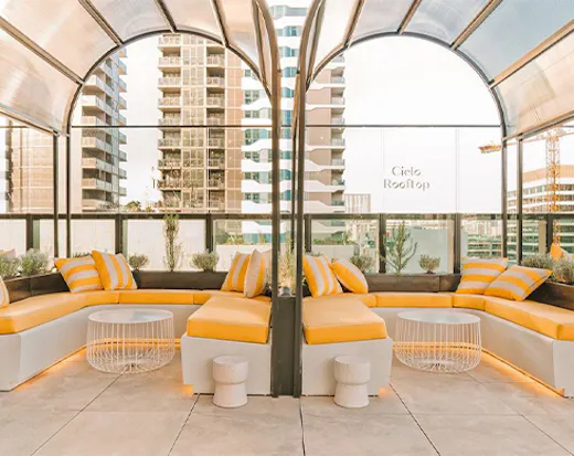 Lounge seats at a rooftop bar