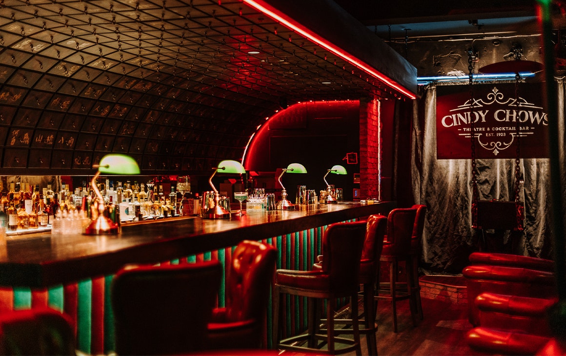 inside cindy chows, with a long bar