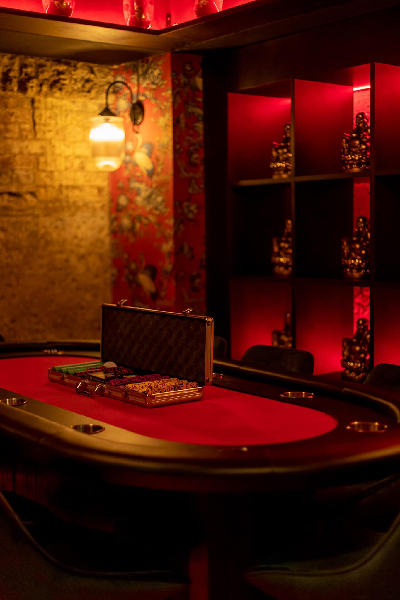 a poker table in a dim room