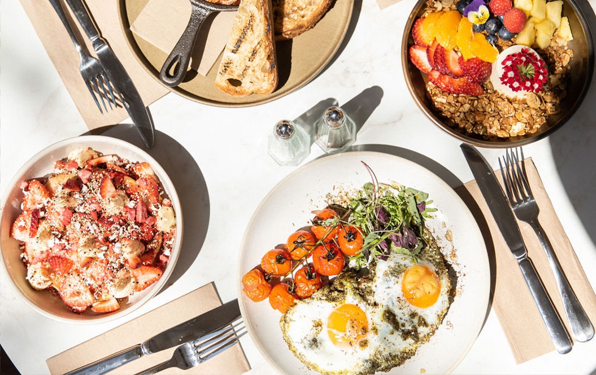 four breakfast dishes on a talbe