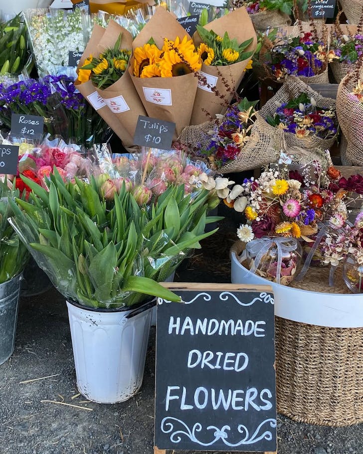 Colourful flowers set up for sale at the Clevedon Village Farmersâ Market.