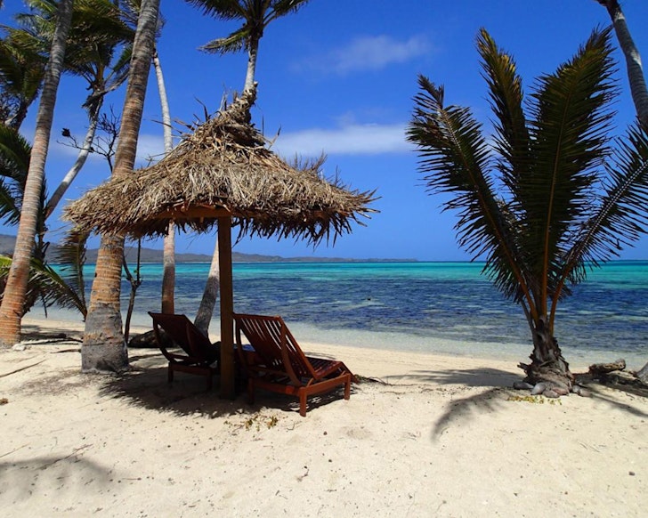 Chairs on a beach at Coconut resort fiji