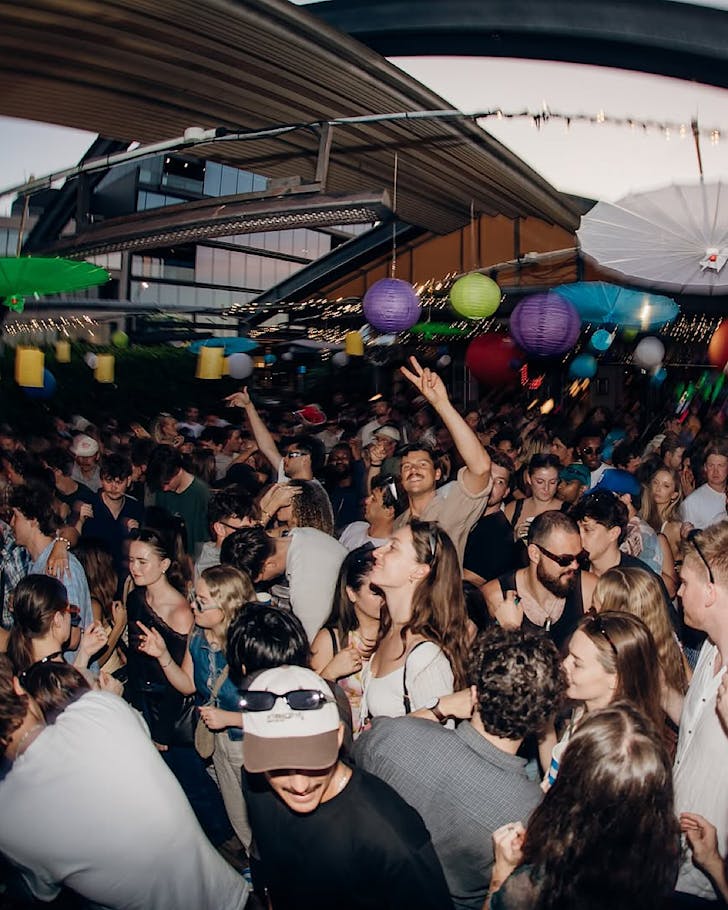 A fish eye shot of a raging party at a Collekt House electronic music gig.