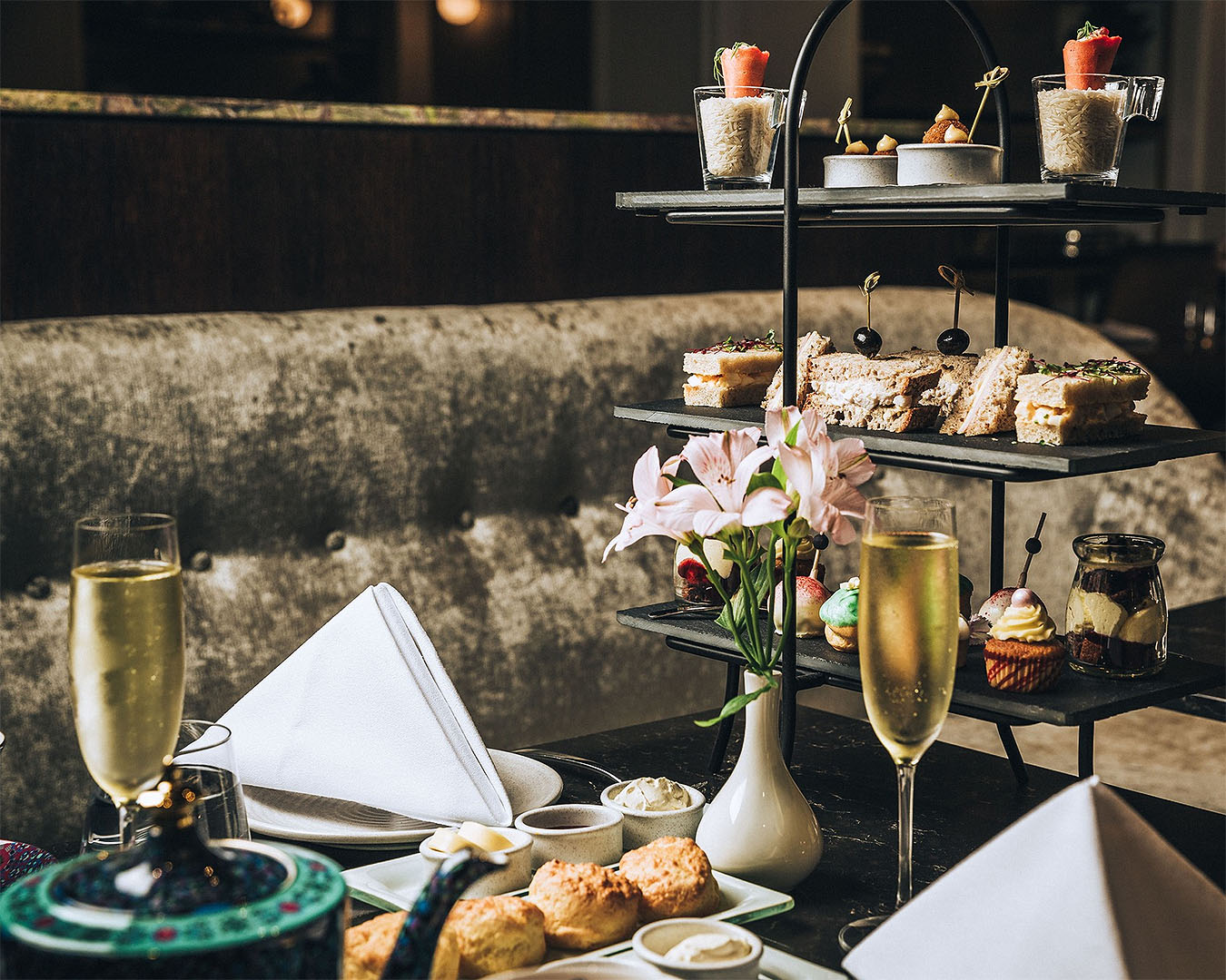 A delicious looking spread at Cooke's with glasses of champagne on standby. This is definitely one of the best high teas in Auckland.