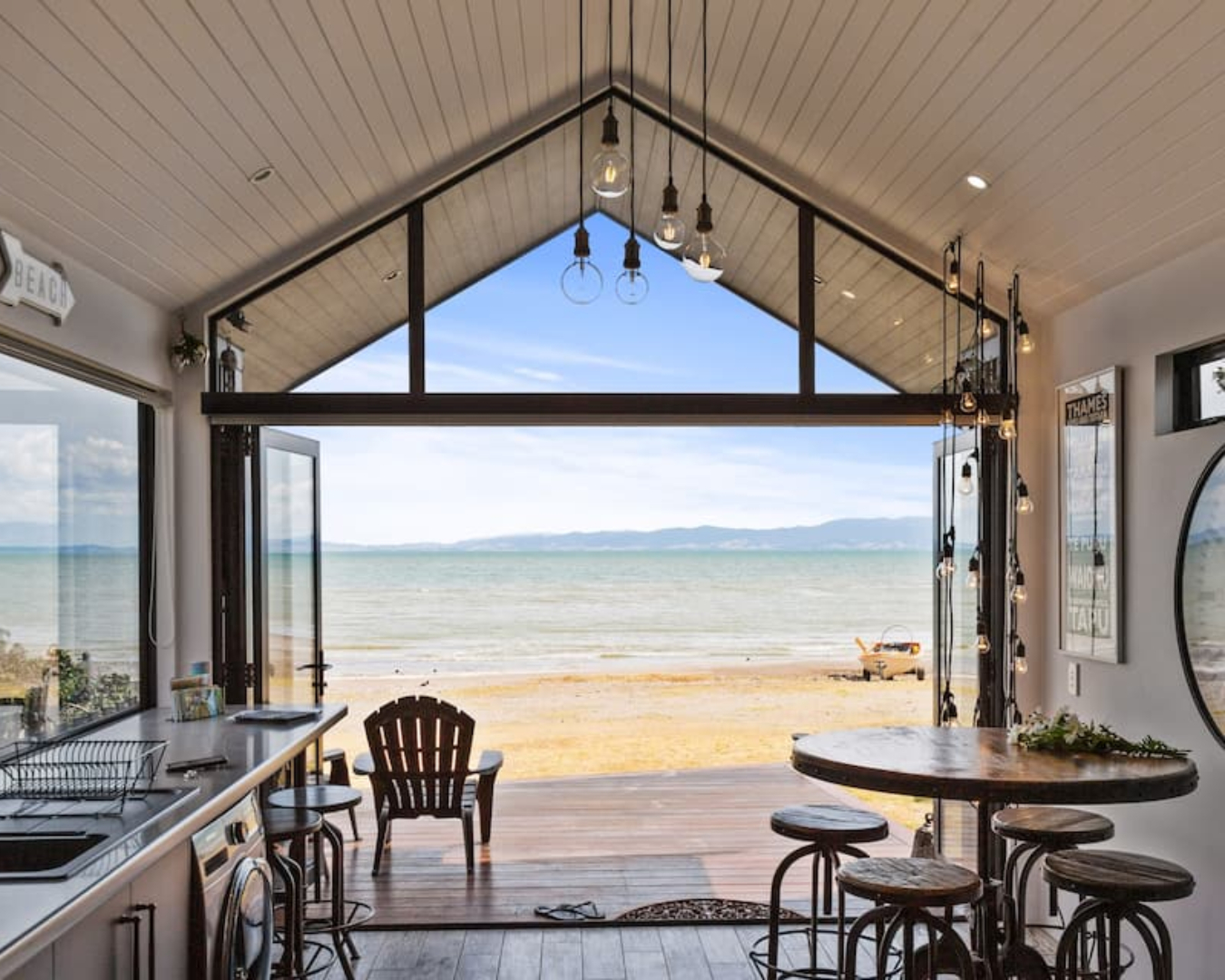 The beach lies right outside the doors of this gorgeous Tapu Airbnb