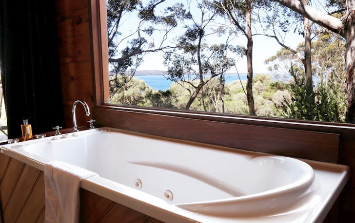a bath overlooking the ocean