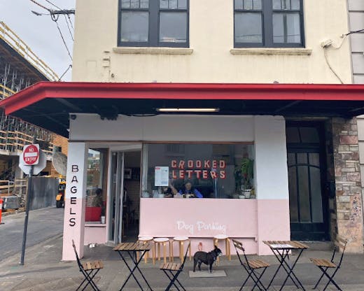A casual bagel cafe on a sunny corner in Melbourne.