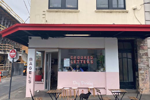 A casual bagel cafe on a sunny corner in Melbourne.