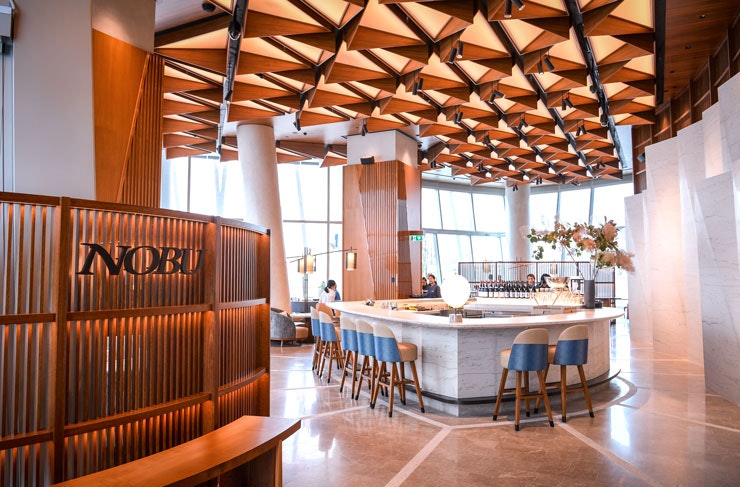 The entrance to Nobu in Sydney, which is flanked with timber. 