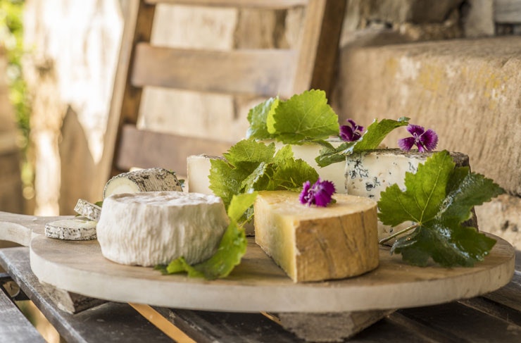 A cheeseboard piled with Cupitt's Estate cheeses 