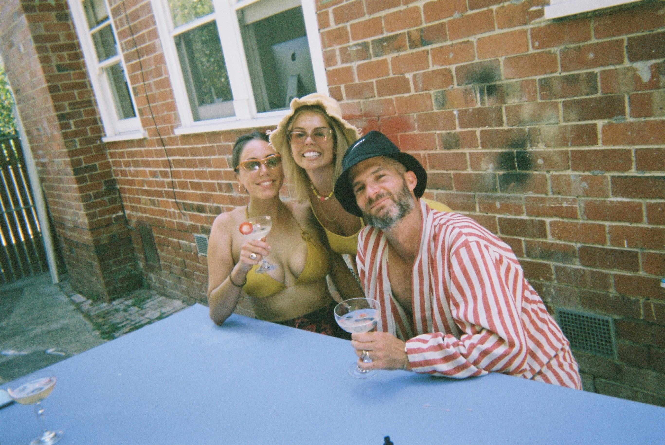 Mates smile for a photo together