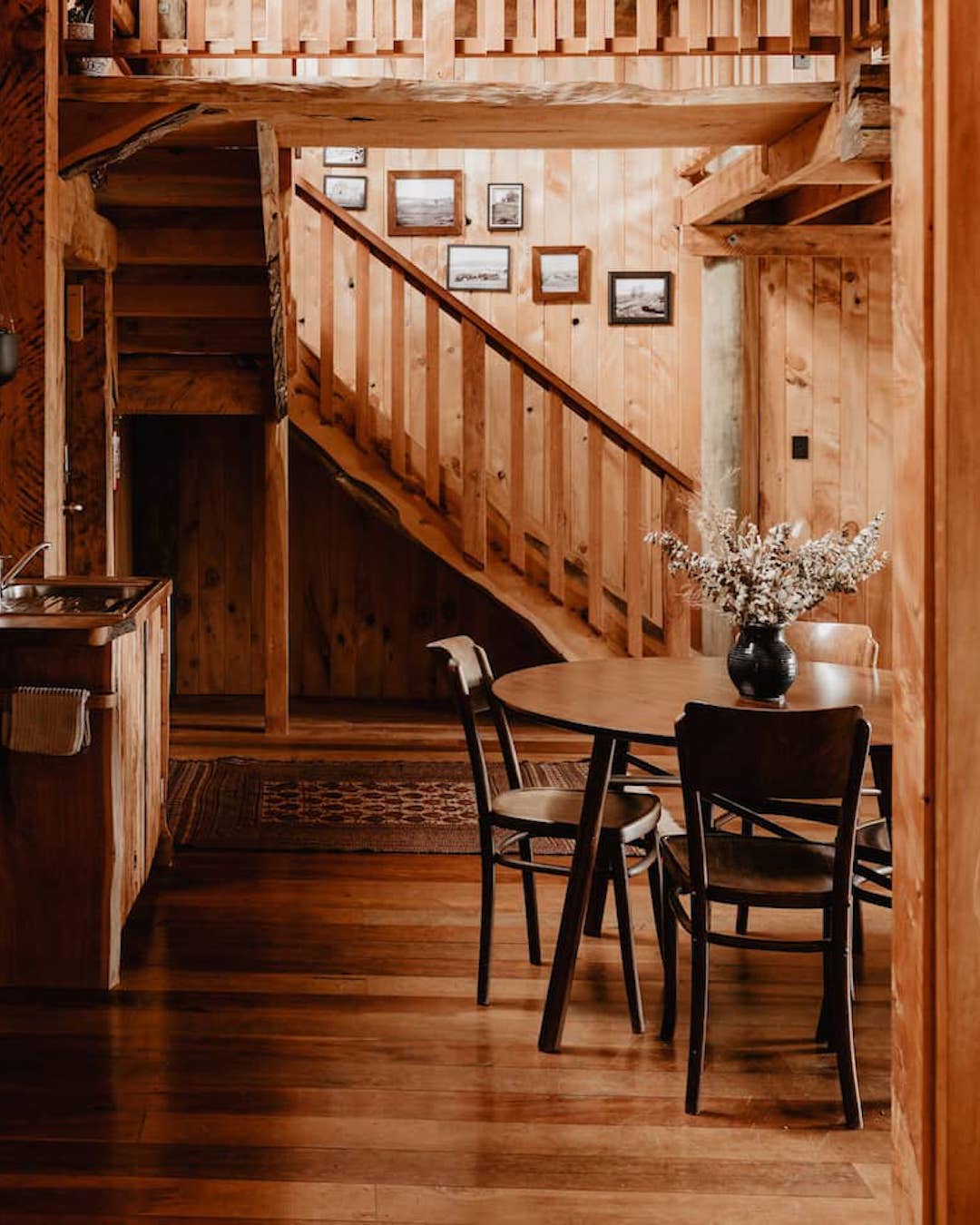 A wood-panelled cabin interior with rustic decor