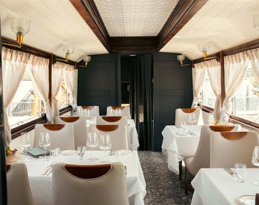 the interior of a restaurant in a bus
