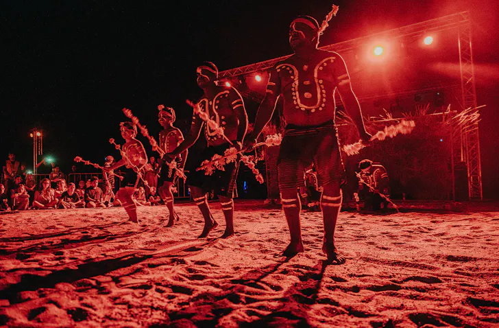 Aboriginal dancers at night in a ceremonial dance in Karijini.