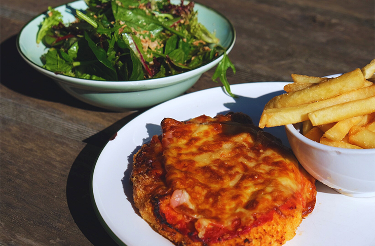 Looking for things to do in the Dandenong Ranges? Try Victoria's best parma, covered in cheese and red sauce, at Paradise Valley Hotel.