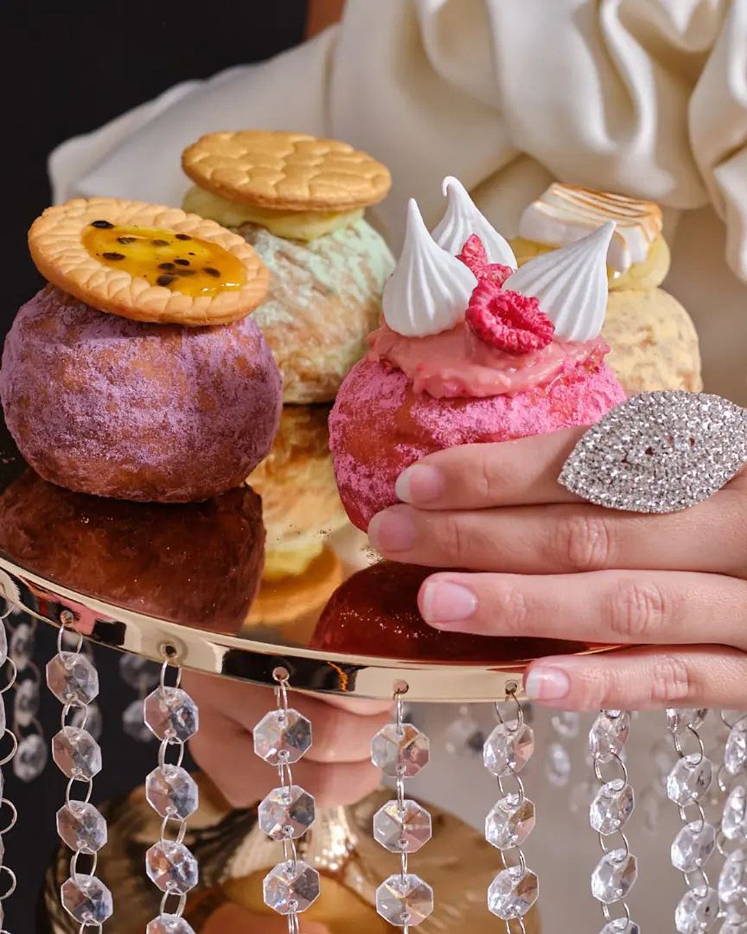 Showcase of couture dougnuts from New Zealand's first couture doughnut shop, Deverauxs