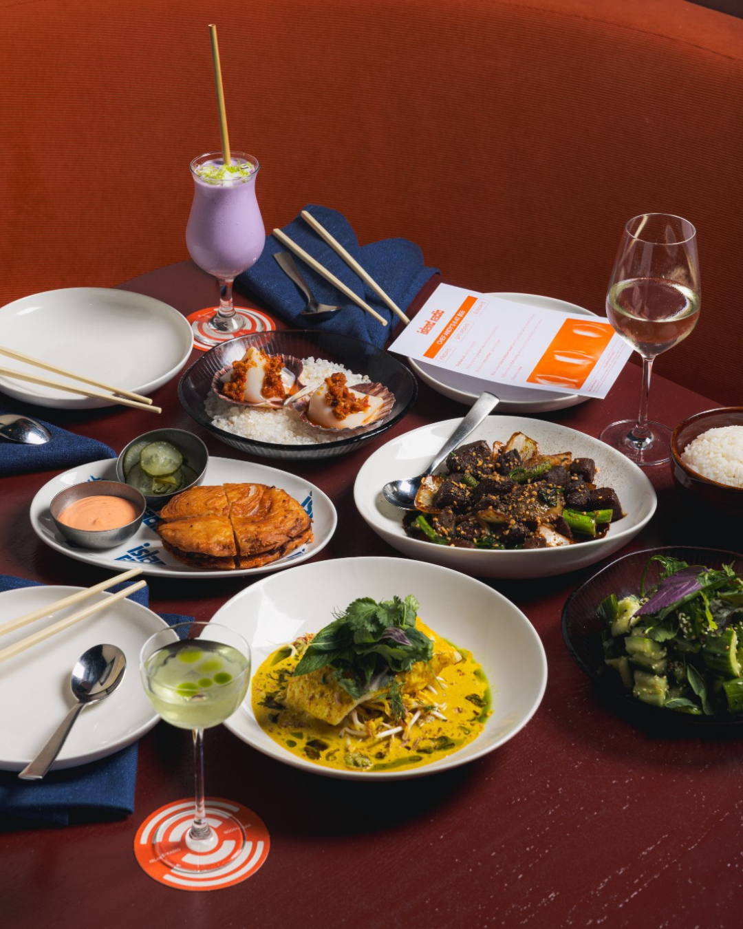 dine out with ubereats island radio table with food and drinks