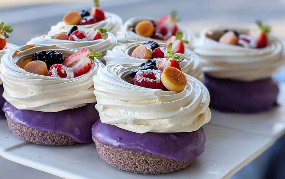 purple baked doughnuts topped with pavolov