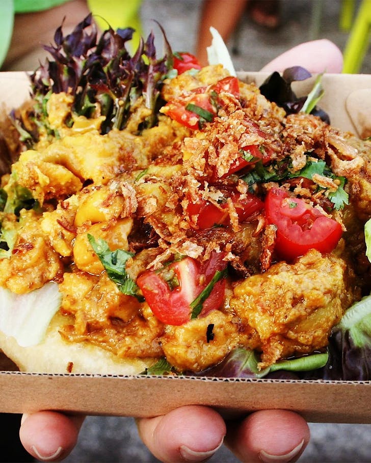 A delicious fry bread loaded with toppings from Eat Adlib