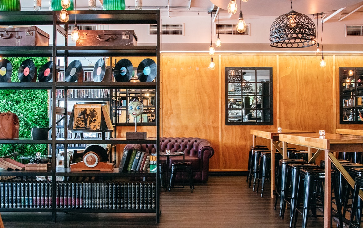 a bar with a cosy leather couch