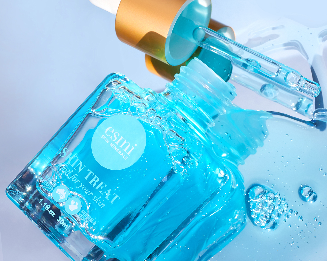 A close up of beautiful blue bottles, one of the best skincare brands available in NZ.