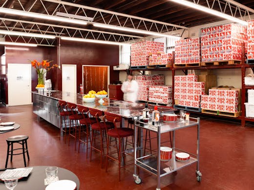 The long marble table at Ester Spirits Distillery & Tasting Room