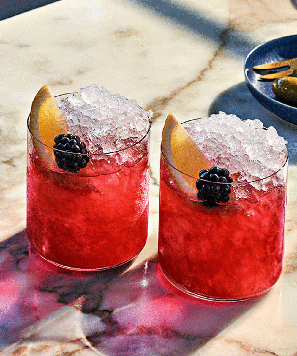 A gif showcasing the Bombay Bramble cocktail and a bottle of Bombay Bramble