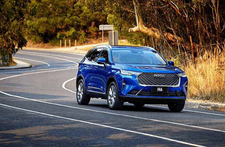 A gif showcasing johanna beach camping and Haval's H6 enroute. 