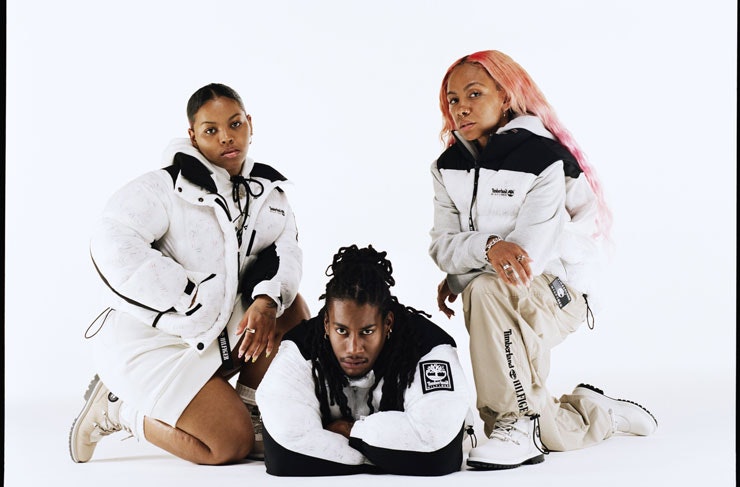 A group of models wearing the Tommy Hilfiger x Timberland collection