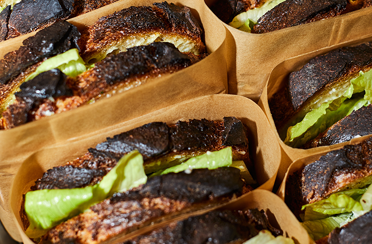 A tray of chicken sandwiches, one of the top lunch Melbourne destinations. 