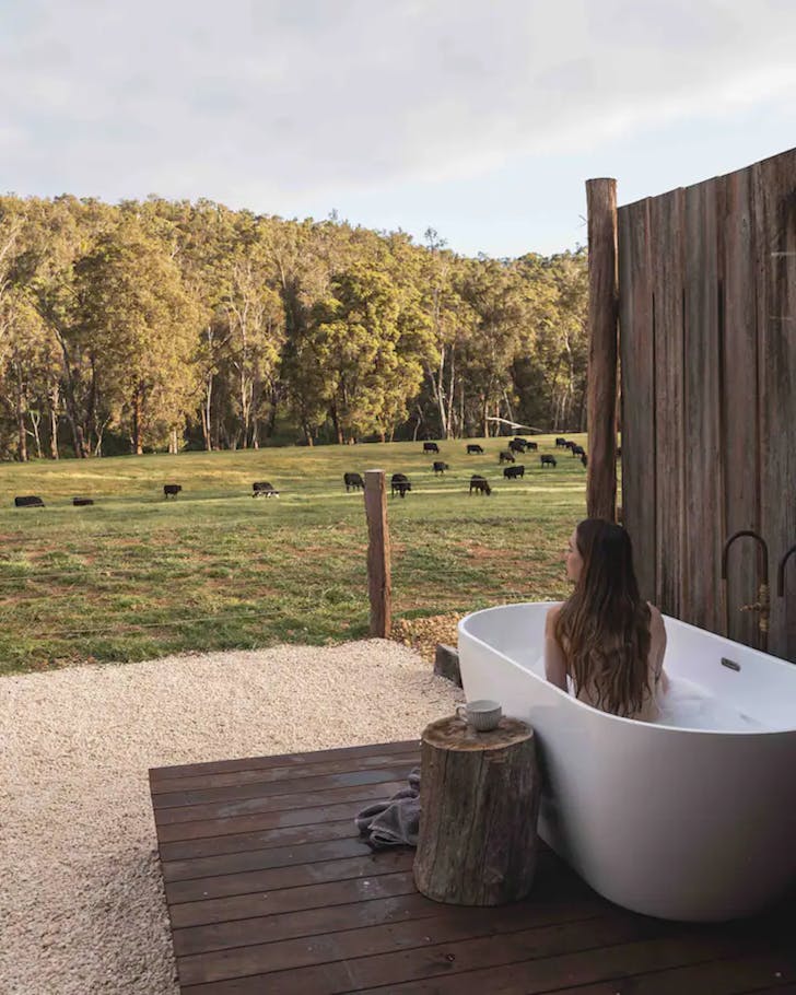 Someone enjoying the outdoor bath at Cleves Hut