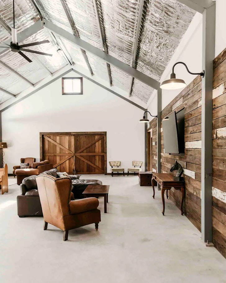 The rustic interior at Luxury Woolshed Farm Retreat one of the best farm stays near Brisbane