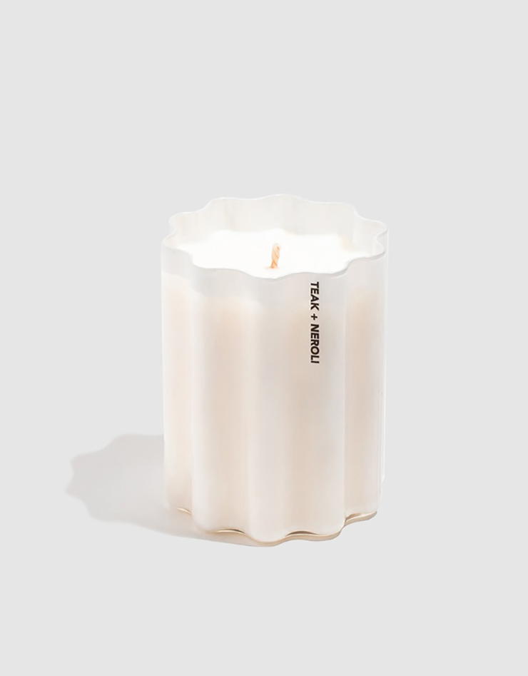 One of the best scented candles, coloured white, on a white background.