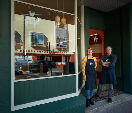  Laura Dalrymple and Grant Hilliard outside the painted green store front of Feather and Bone Waverley