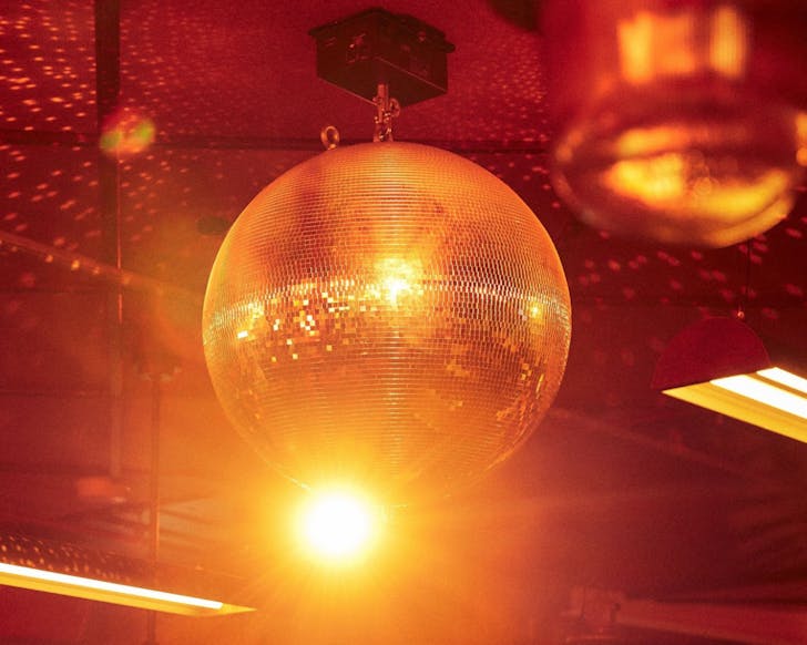 a disco ball at felons barrel room, opening this weekend in sydney