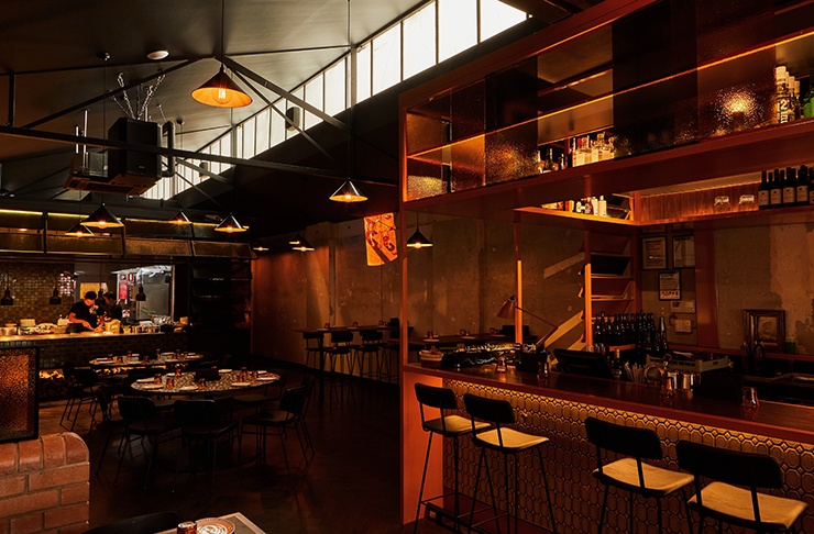 A dimly lit restaurant, the location of a best bottomless brunch Melbourne.
